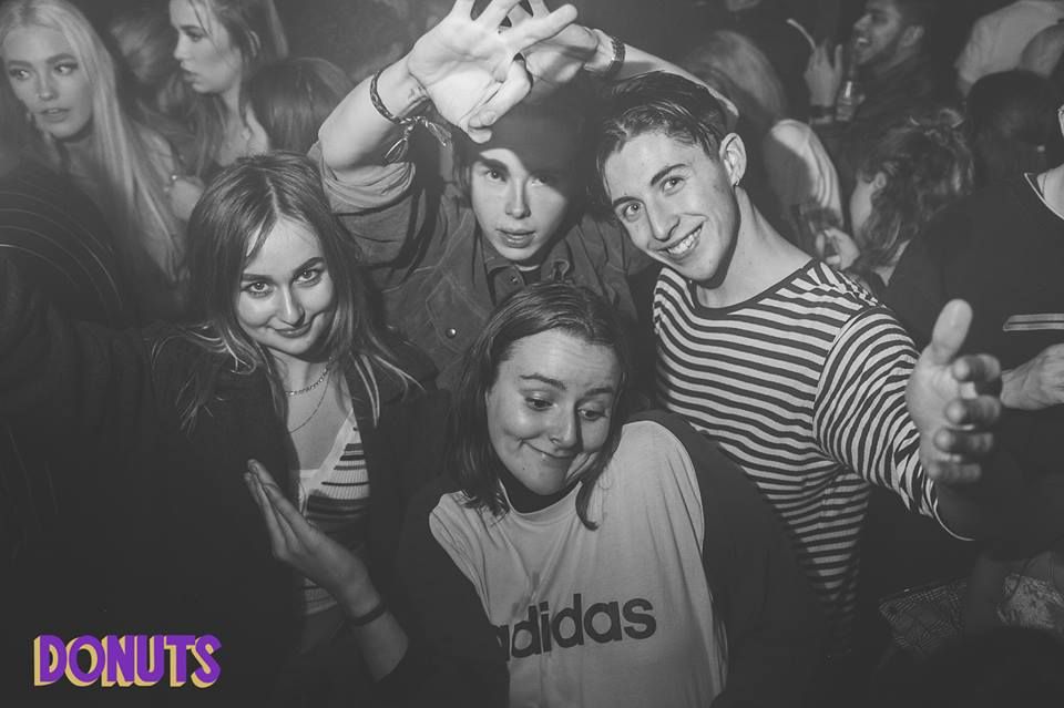 Image may contain: Crowd, Night Club, Club, Face, Party, Human, Person