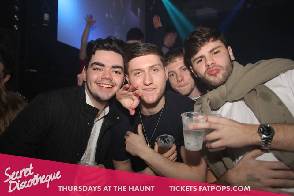 Image may contain: Drink, Beverage, Wristwatch, Night Club, Club, Party, Human, Person