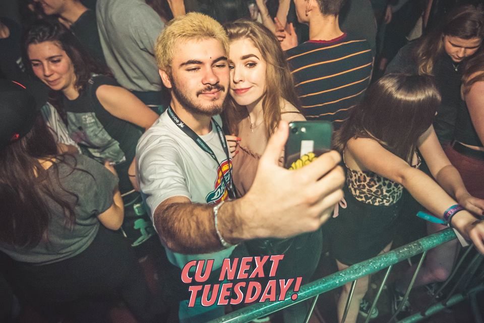 Image may contain: Leisure Activities, Cell Phone, Phone, Mobile Phone, Electronics, Night Club, Night Life, Club, Person, Human, Party