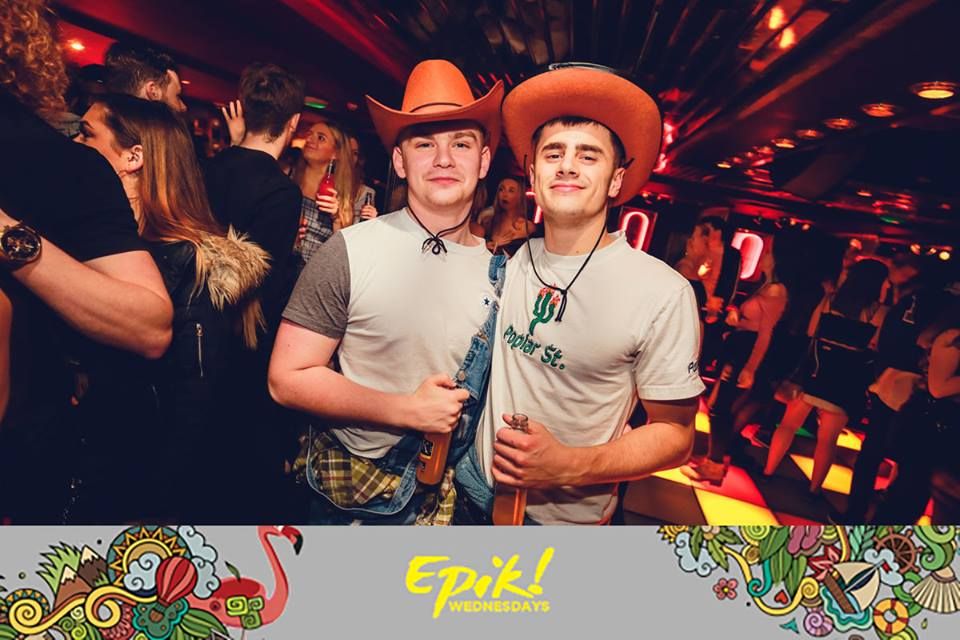 Image may contain: Leisure Activities, Party, Night Club, Club, Clothing, Apparel, Hat, Human, Person