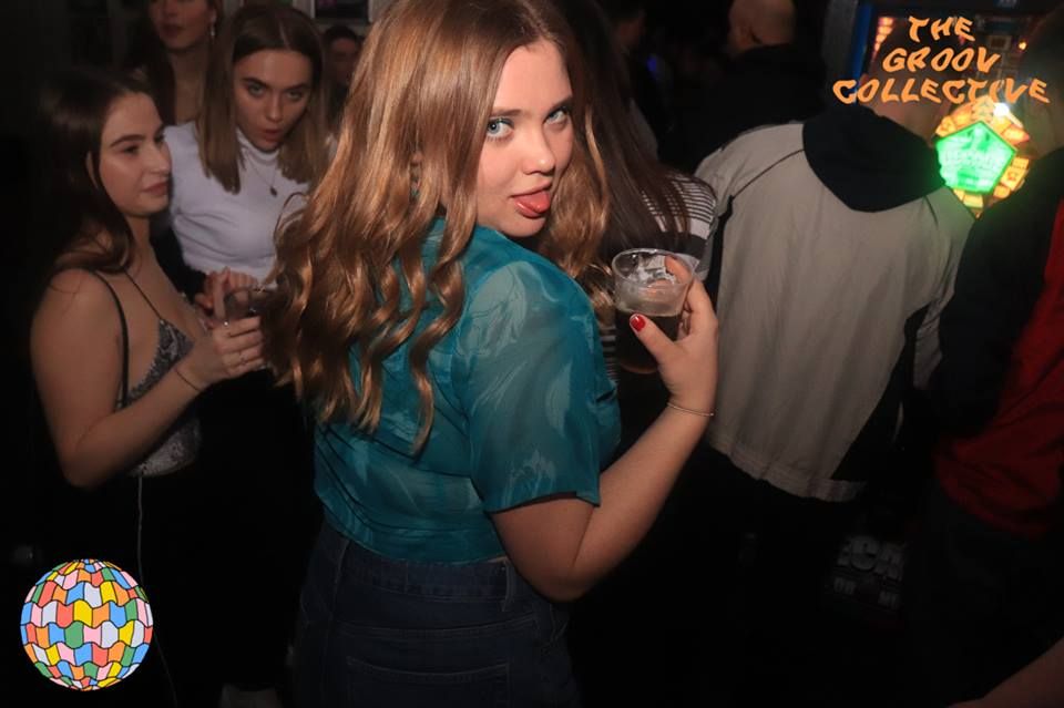 Image may contain: Night Life, Party, Night Club, Club, Person, Human