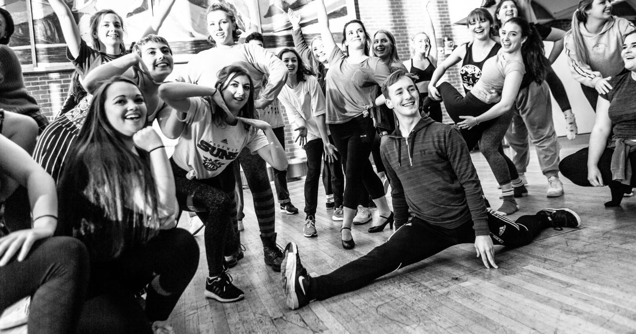 Image may contain: Photo, Photography, Portrait, People, Female, Crowd, Leisure Activities, Dance Pose, Face, Clothing, Footwear, Apparel, Shoe, Human, Person
