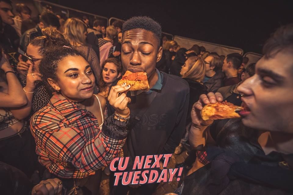 Image may contain: Poster, Advertisement, Interior Design, Indoors, Food, Pizza, Audience, Crowd, Person, Human