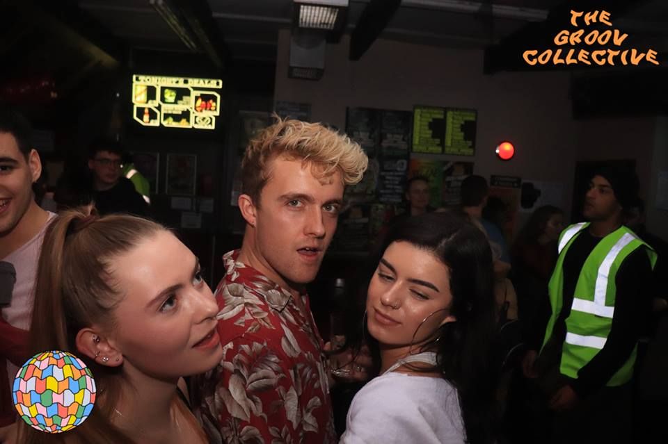Image may contain: Pub, Bar Counter, Night Life, Night Club, Club, Person, Human