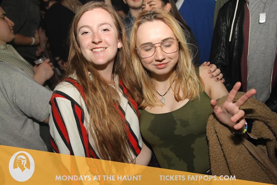 Image may contain: Audience, Crowd, Club, Face, Glasses, Accessories, Accessory, Party, Person, Human
