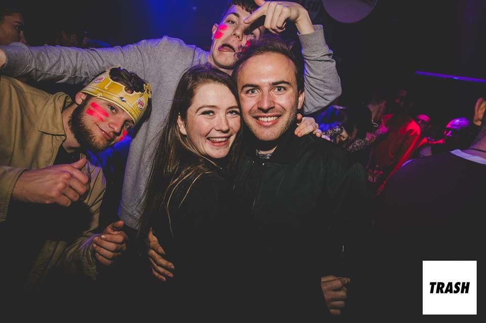 Image may contain: Disco, Face, Night Life, Apparel, Clothing, Helmet, Night Club, Club, Human, Person, Party