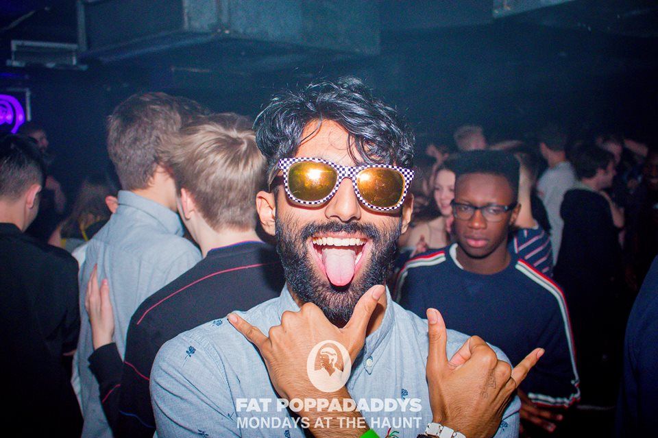 Image may contain: Face, Crowd, Night Life, Skin, Party, Night Club, Club, Accessory, Accessories, Sunglasses, Human, Person