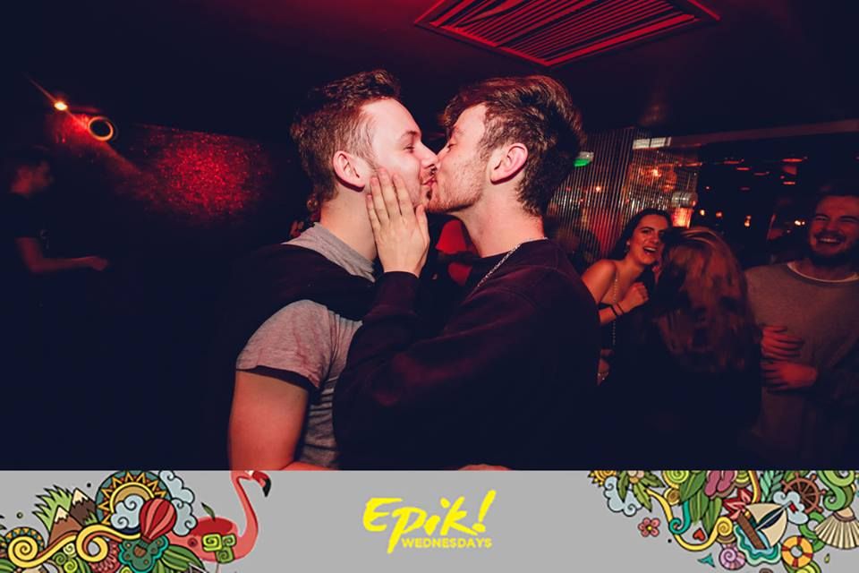 Image may contain: Night Club, Club, Kiss, Kissing, Dating, Night Life, Make Out, Person, Human