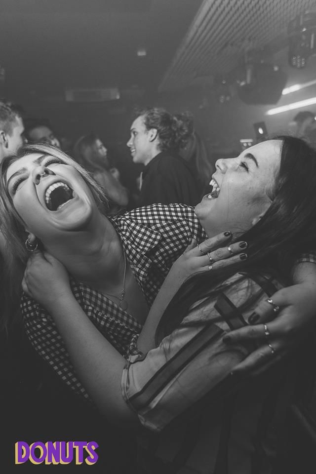 Image may contain: Night Club, Laughing, Photo, Portrait, Photography, Smile, Female, Club, Party, Face, Human, Person
