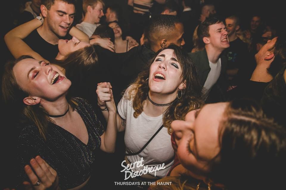 Image may contain: Night Club, Night Life, Crowd, Audience, Club, Party, Person, Human