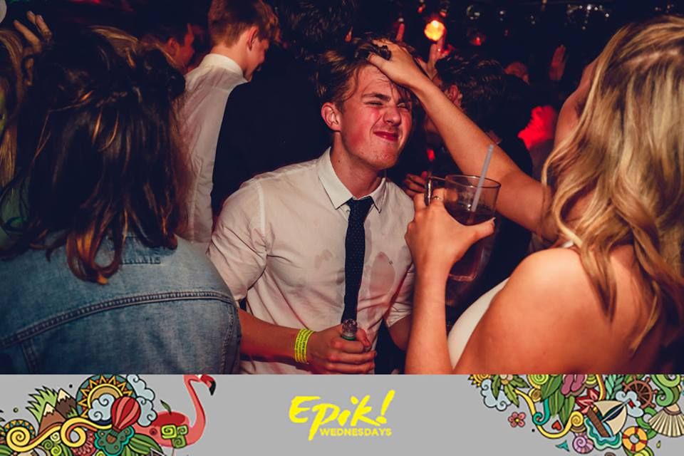 Image may contain: Night Life, Sunglasses, Tie, Accessories, Accessory, Night Club, Club, Party, Human, Person