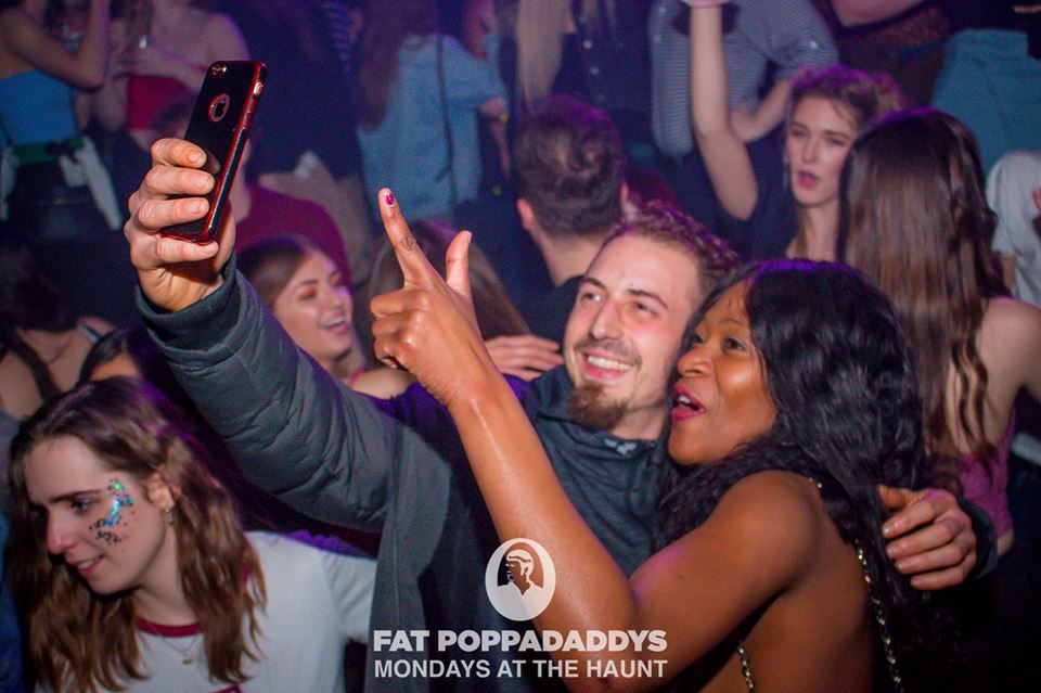 Image may contain: Party, Night Club, Night Life, Club, Human, Person, Cell Phone, Electronics, Phone, Mobile Phone