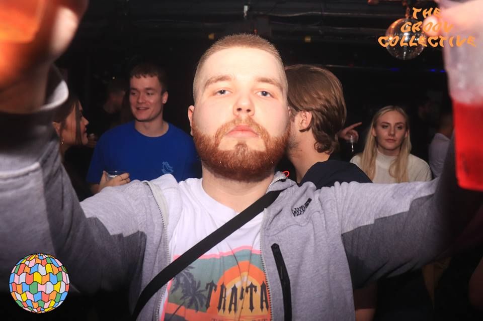 Image may contain: Photo, Photography, Portrait, Crowd, Club, Apparel, Clothing, Man, Night Life, Beard, Party, Indoors, Interior Design, Human, Person, Face