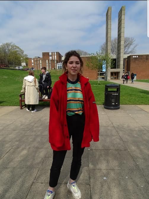 Image may contain: Pants, Costume, Tree, Female, Outdoors, Jacket, Vegetation, Coat, Plant, Grass, Human, Person, Clothing, Apparel, Footwear, Shoe