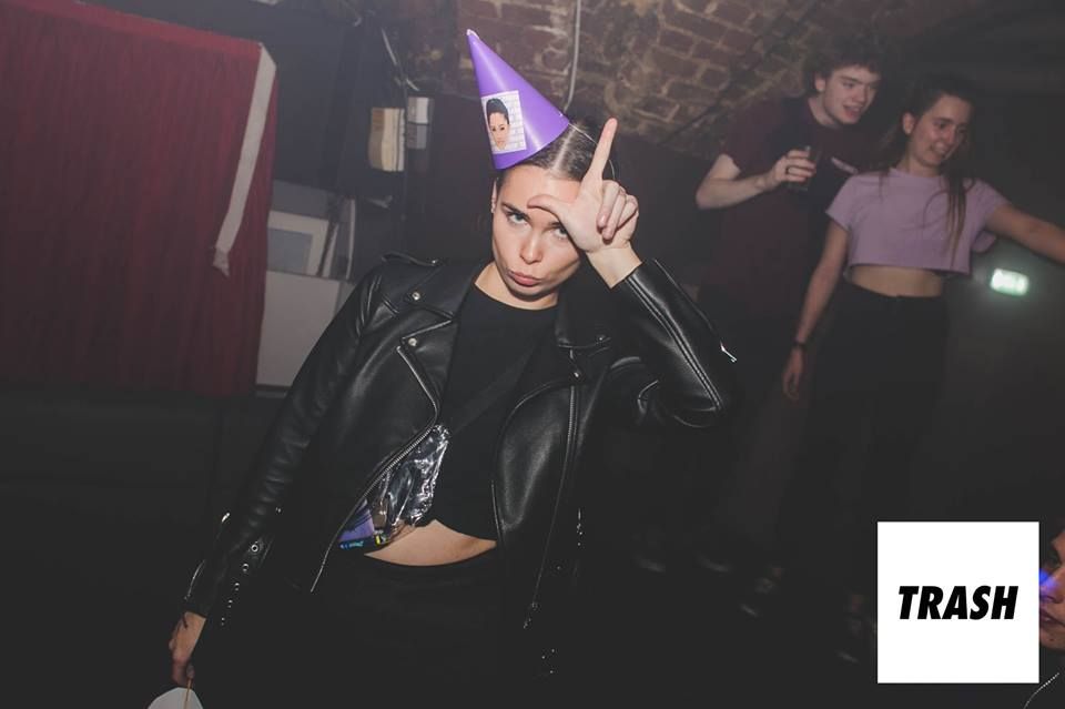 Image may contain: Party Hat, Hat, Person, Human, Clothing, Apparel