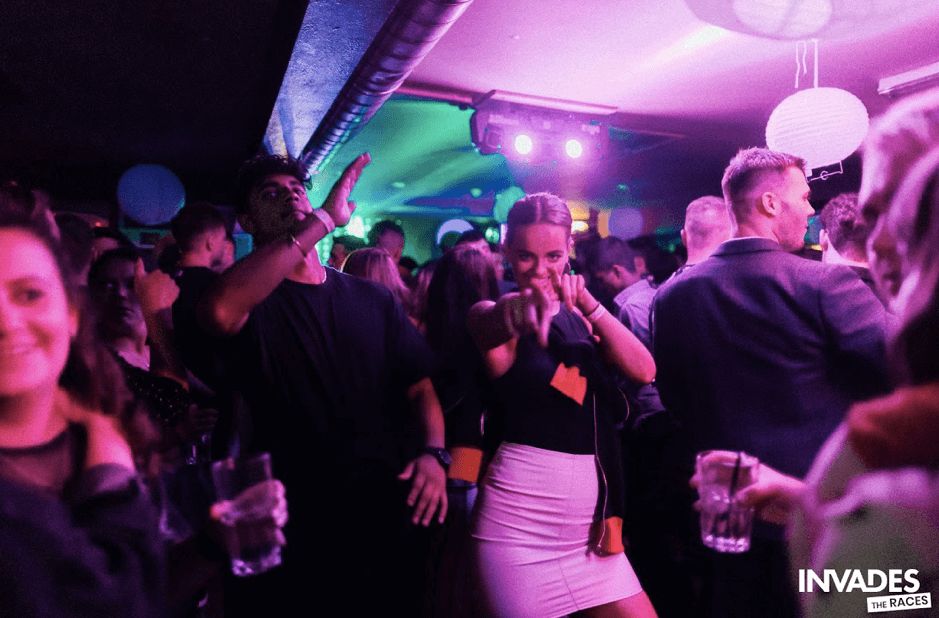 Image may contain: Leisure Activities, Guitar, Musical Instrument, Disco, Night Life, Party, Night Club, Club, Person, Human