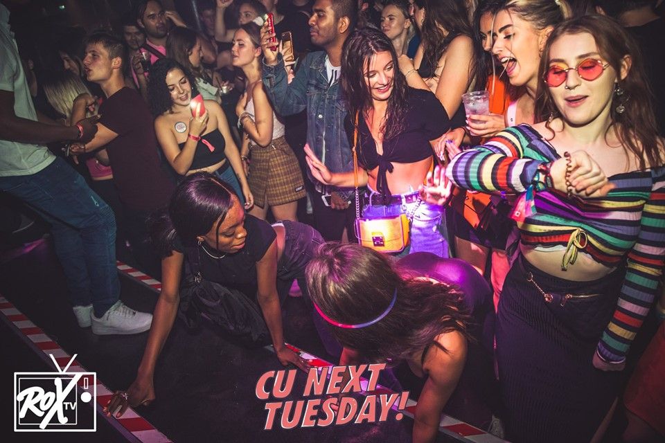 Image may contain: Disco, Night Life, Night Club, Club, Party, Footwear, Clothing, Shoe, Apparel, Person, Human