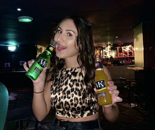 Image may contain: Bartender, Night Club, Beer Bottle, Club, Worker, Bar Counter, Bottle, Pub, Alcohol, Beverage, Drink, Beer, Person, Human