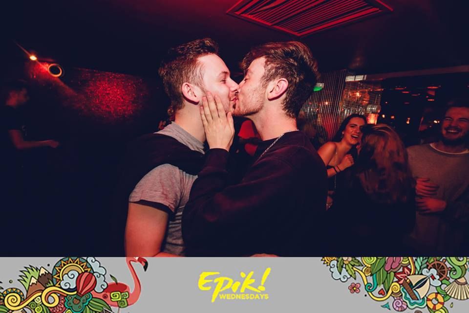 Image may contain: Night Club, Club, Night Life, Kiss, Kissing, Dating, Make Out, Human, Person