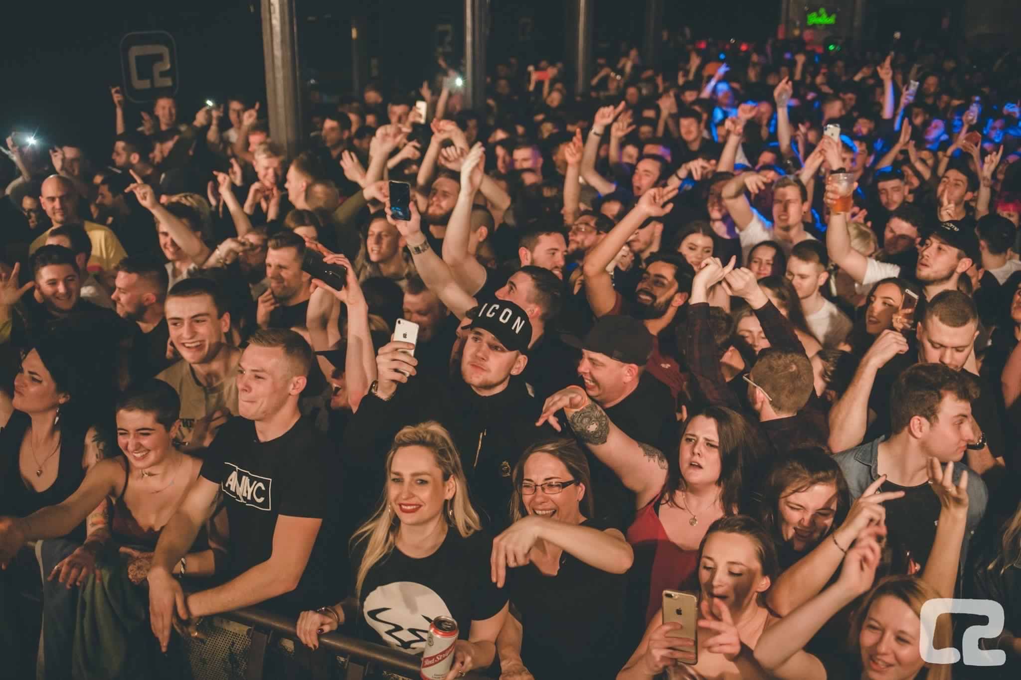 Image may contain: Night Club, Leisure Activities, Club, Crowd, Audience, Night Life, Party, Human, Person