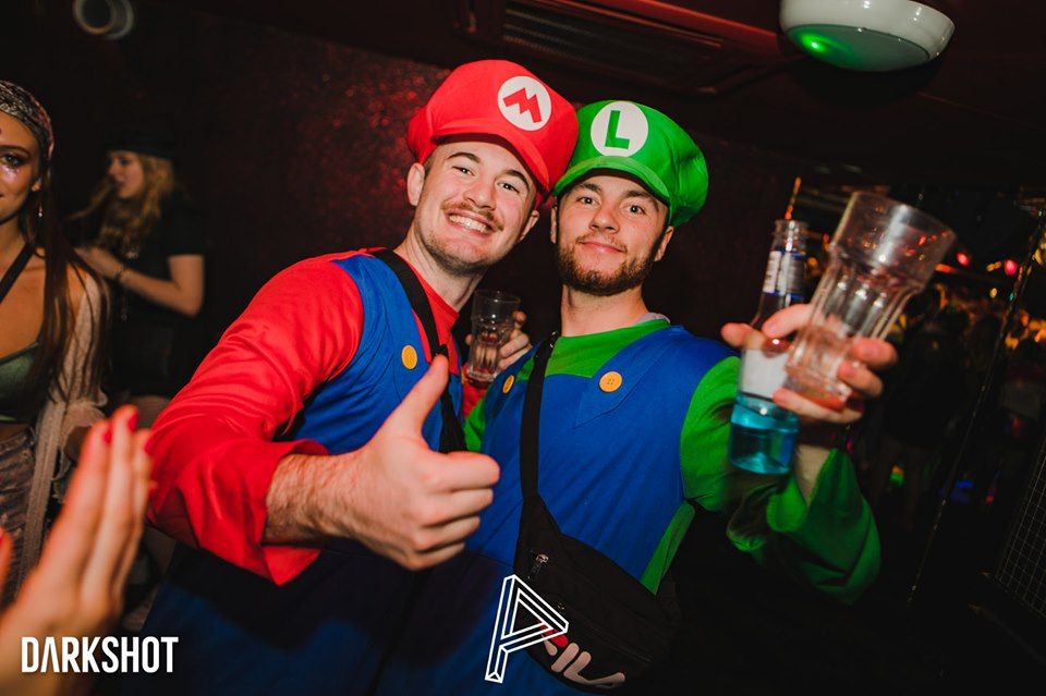 Image may contain: Alcohol, Beer, Beverage, Drink, Party, Hat, Night Life, Clothing, Helmet, Apparel, Bar Counter, Pub, Night Club, Club, Person, Human