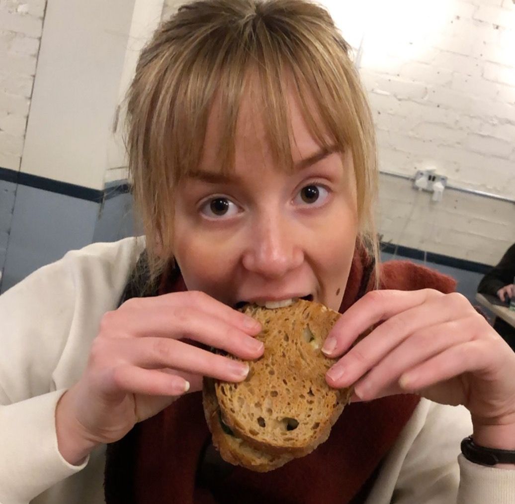 Image may contain: Bread, Eating, Finger, Burger, Food, Person, Human