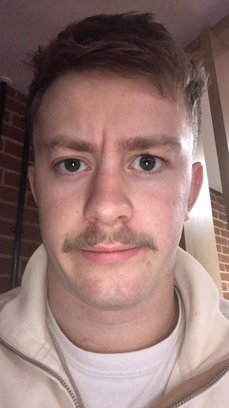 Image may contain: Face, Mustache, Person, Human