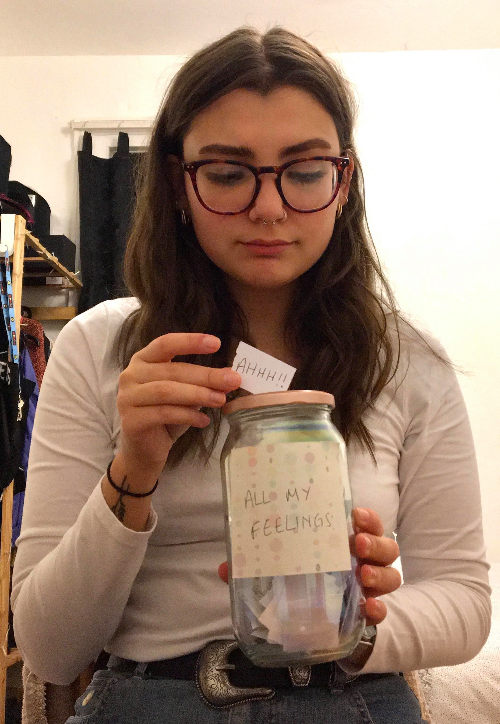 Image may contain: Finger, Accessory, Accessories, Glasses, Jar, Human, Person