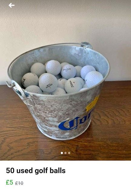 Image may contain: Golf, Golf Ball, Ball, Sports, Sport, Bucket