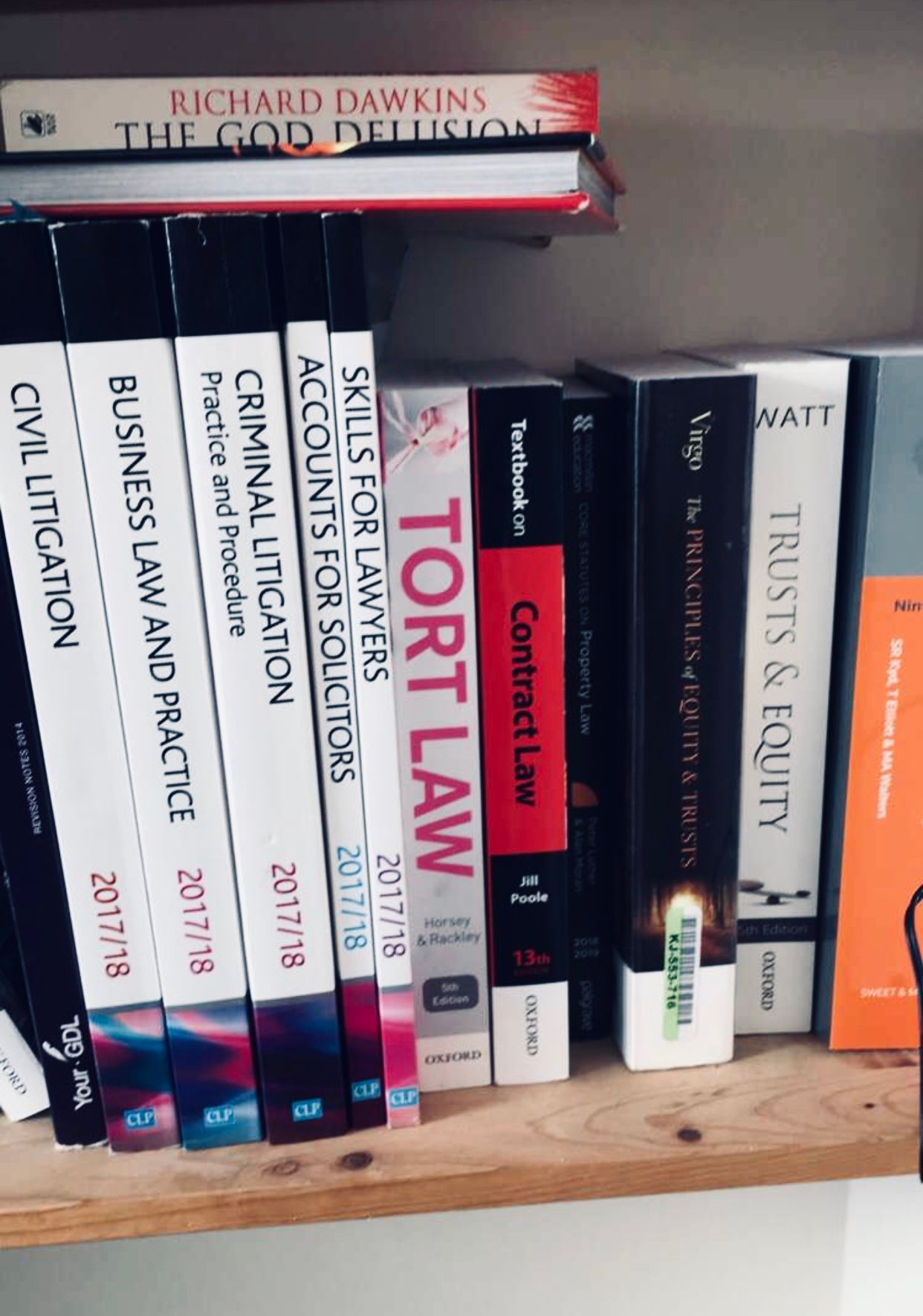 Image may contain: Library, Indoors, Room, Shelf, Bookcase, Furniture, Book
