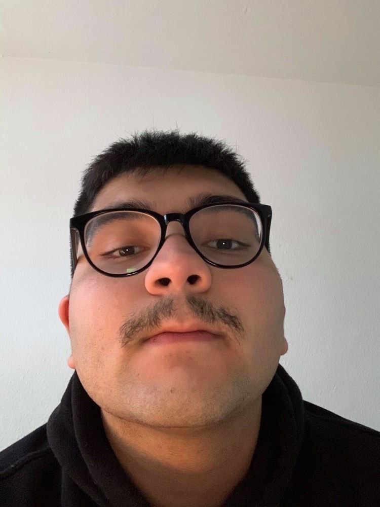 Image may contain: Photography, Photo, Portrait, Mustache, Face, Glasses, Accessories, Accessory, Person, Human