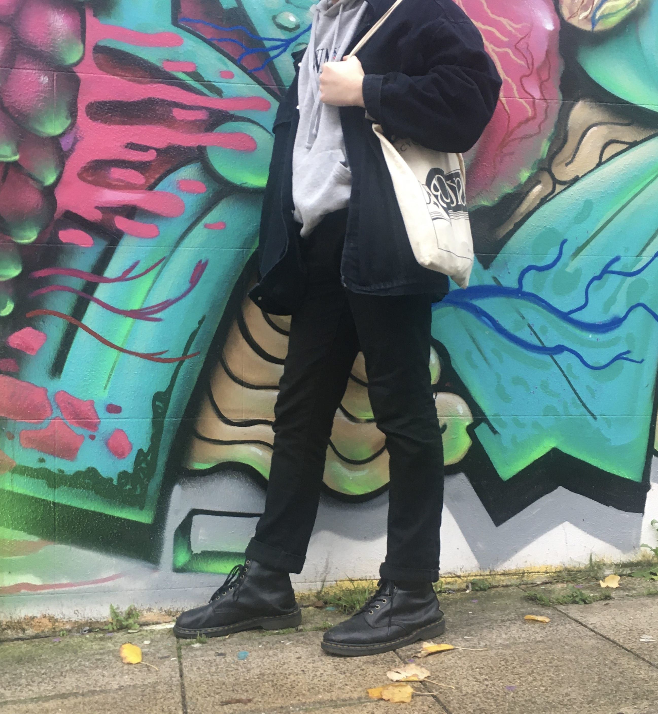 Image may contain: Wall, Painting, Mural, Person, Human, Art, Graffiti, Clothing, Shoe, Apparel, Footwear