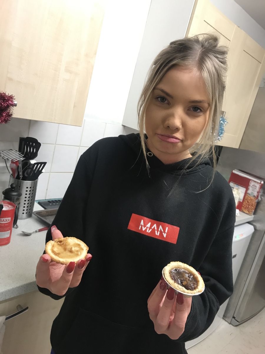 Image may contain: Bun, Dessert, Burger, Bread, Food, Human, Person