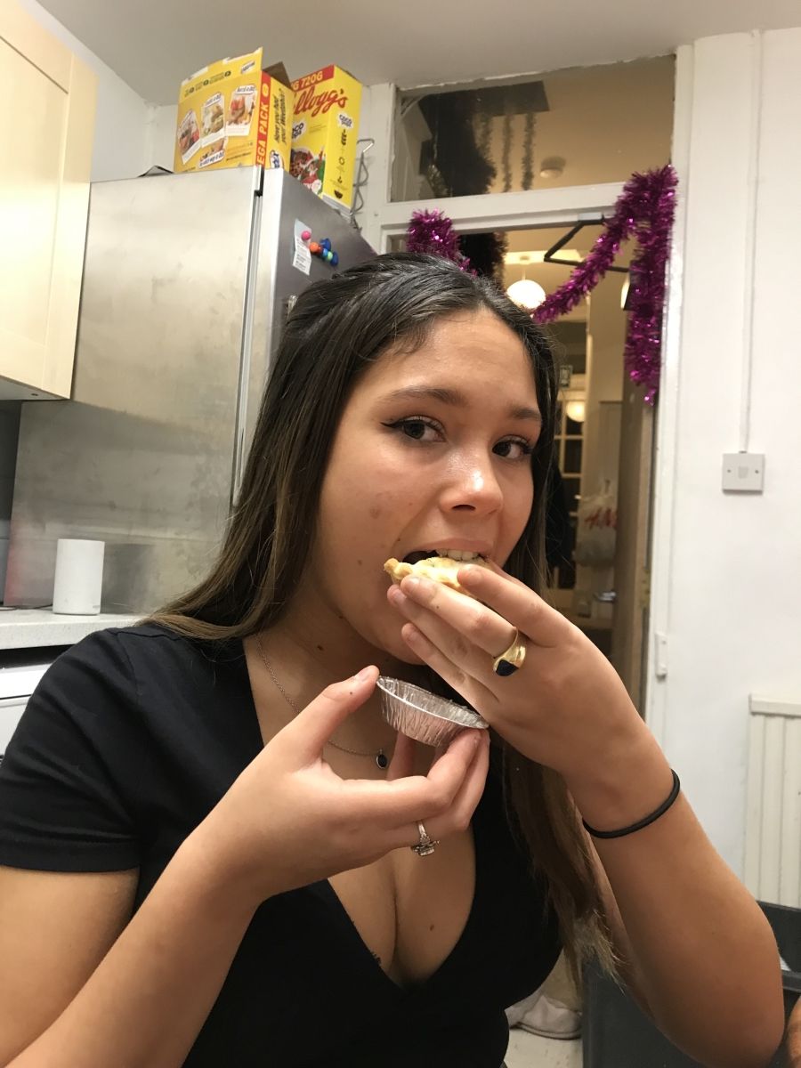 Image may contain: Finger, Eating, Food, Person, Human