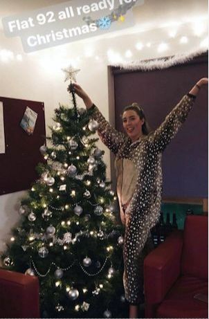 Image may contain: Performer, Costume, Lighting, Human, Person, Tree, Plant