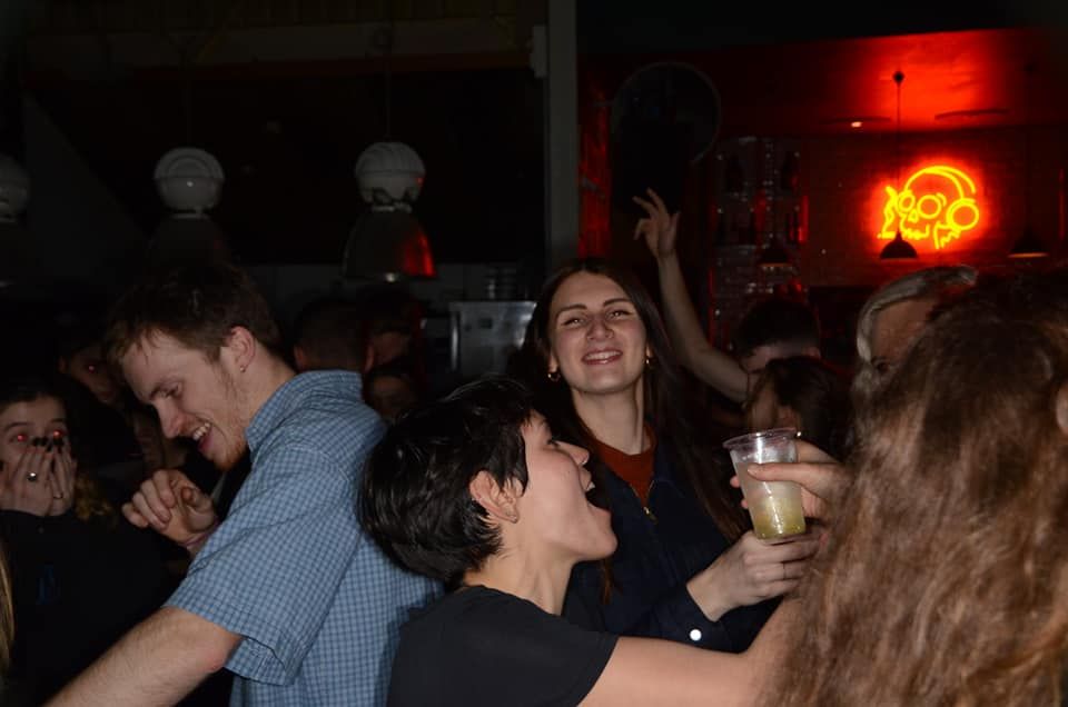 Image may contain: Beverage, Drink, Pub, Bar Counter, Night Club, Party, Club, Night Life, Person, Human