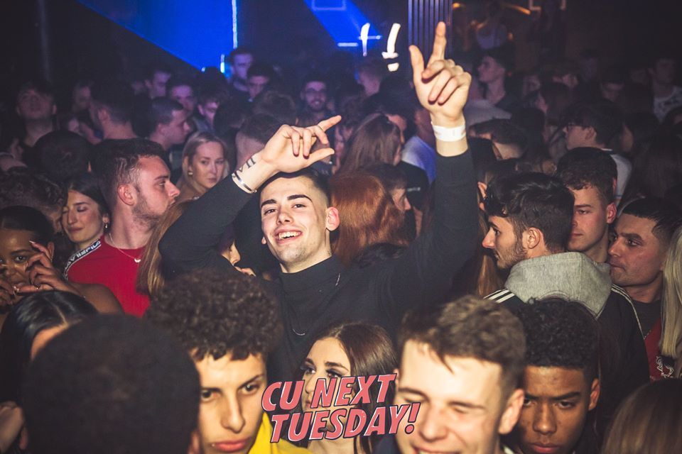 Image may contain: Disco, Lighting, Crowd, Night Club, Club, Night Life, Party, Person, Human