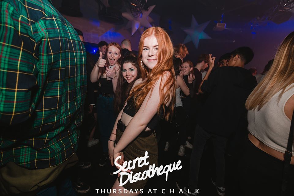 Image may contain: Disco, Night Club, Club, Party, Person, Human
