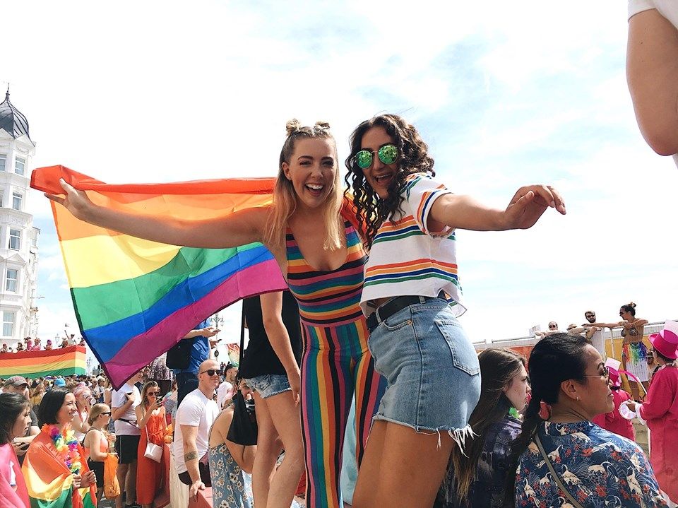 Image may contain: Festival, Female, Crowd, Sunglasses, Accessory, Accessories, Shorts, Clothing, Apparel, Human, Person