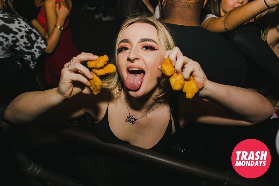 Image may contain: Finger, Food, Hot Dog, Person, Human