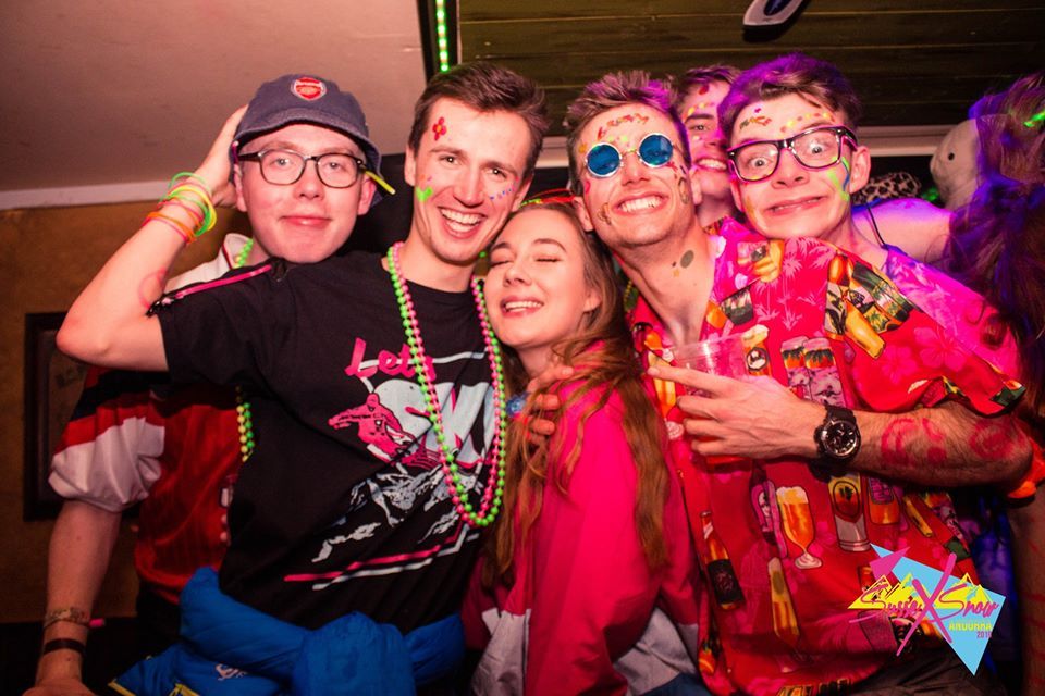 Image may contain: Leisure Activities, Crowd, Face, Night Life, Glasses, Party, Person, Human, Accessories, Sunglasses, Accessory