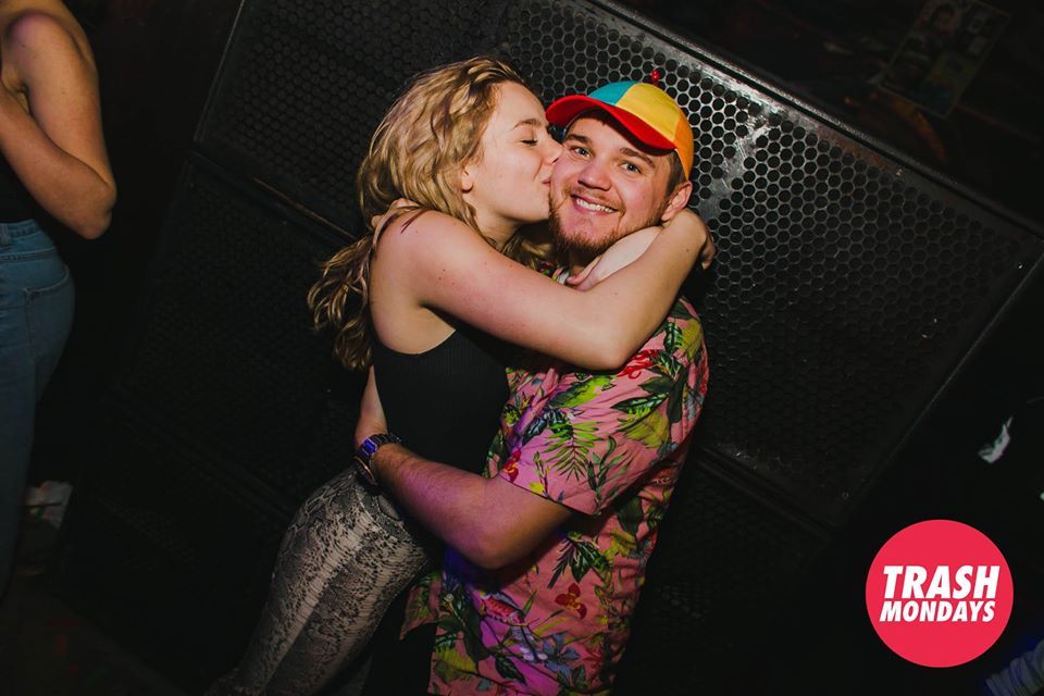 Image may contain: Pants, Night Life, Make Out, Female, Hug, Face, Apparel, Clothing, Human, Person