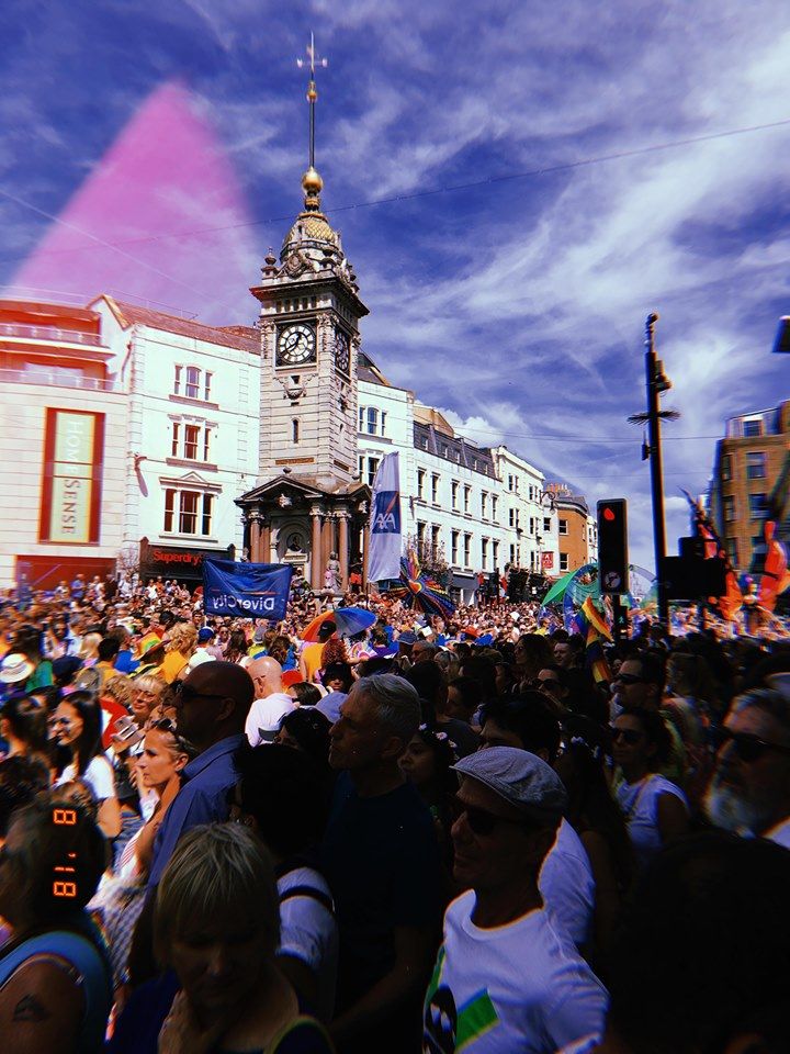 Image may contain: Urban, Town, Downtown, City, Accessory, Sunglasses, Accessories, Festival, Building, Clock Tower, Architecture, Tower, Crowd, Human, Person