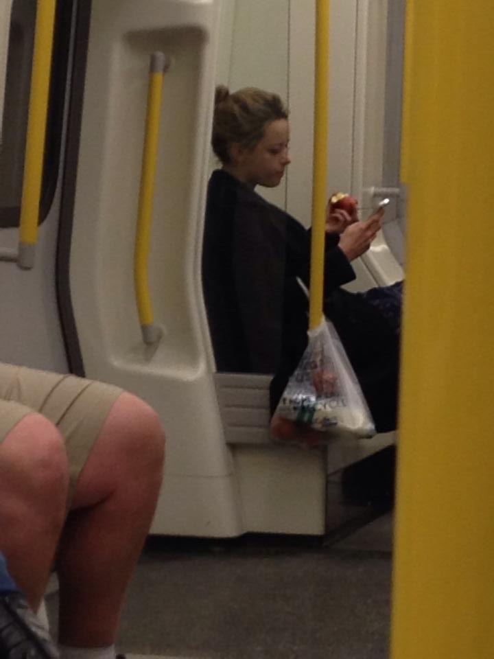 Apparently snapping girls eating apples is a form of entertainment.