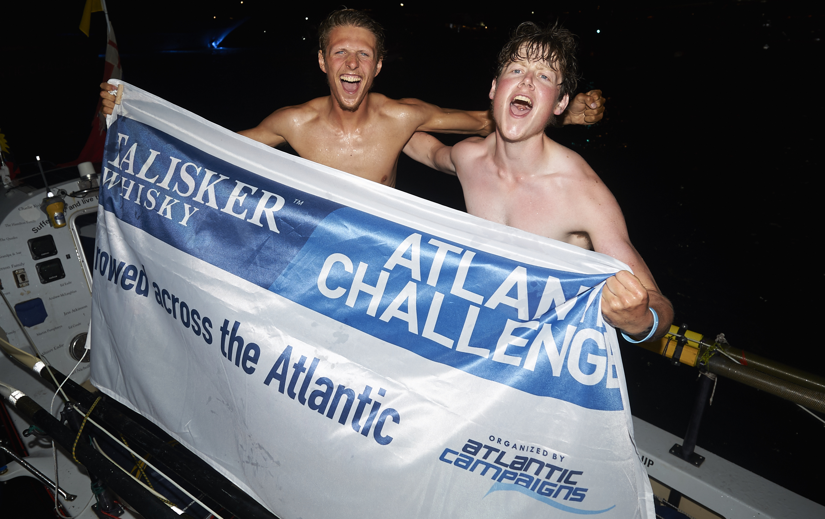 Atlantic Castaways become the youngest pair to row an ocean - Talisker Whisky Atlantic Challenge CREDIT BEN DUFFY L-R Freddie Wright and Jack Galsworthy FLAG