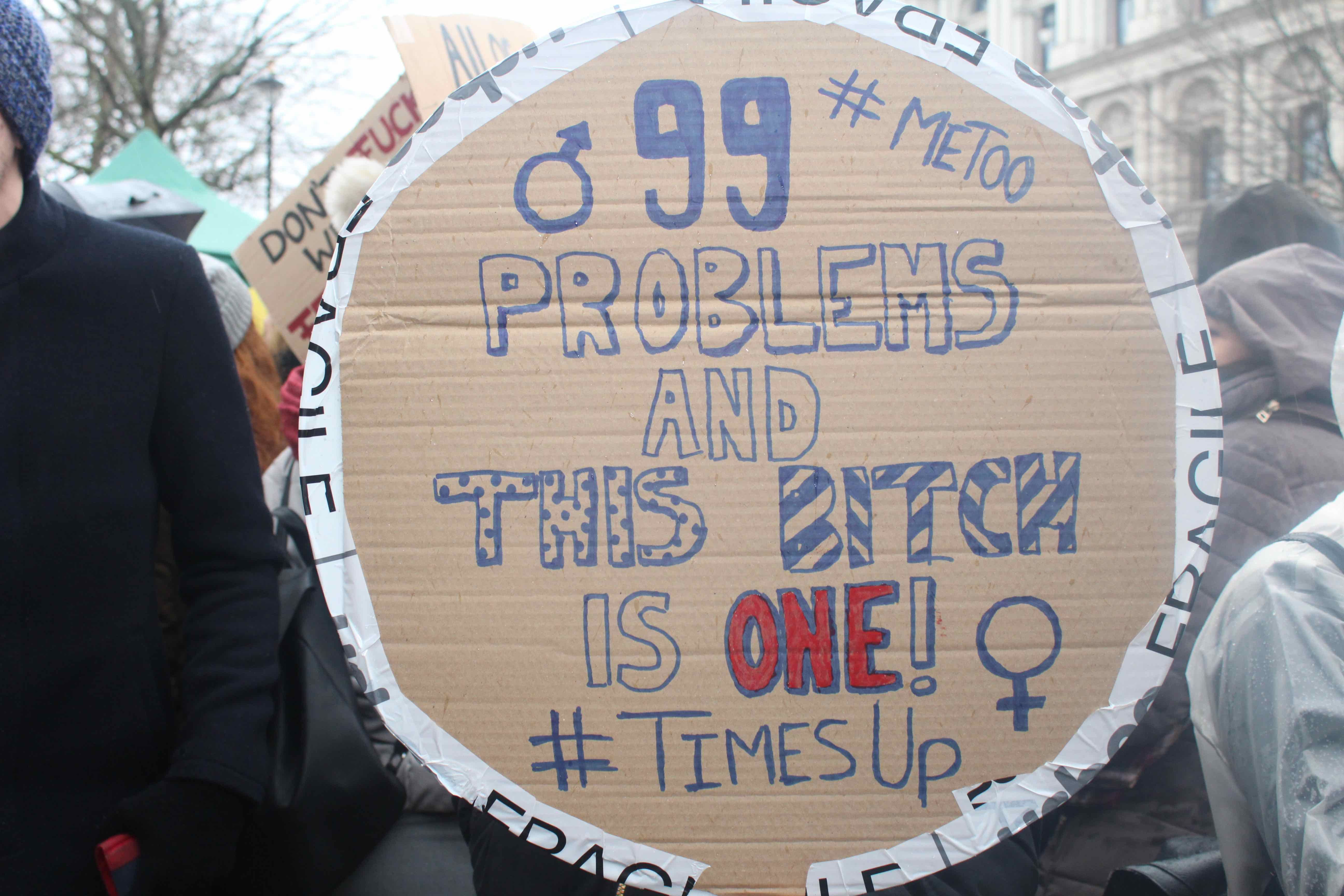 Image may contain: Crowd, Text, Banner, Person, People, Human