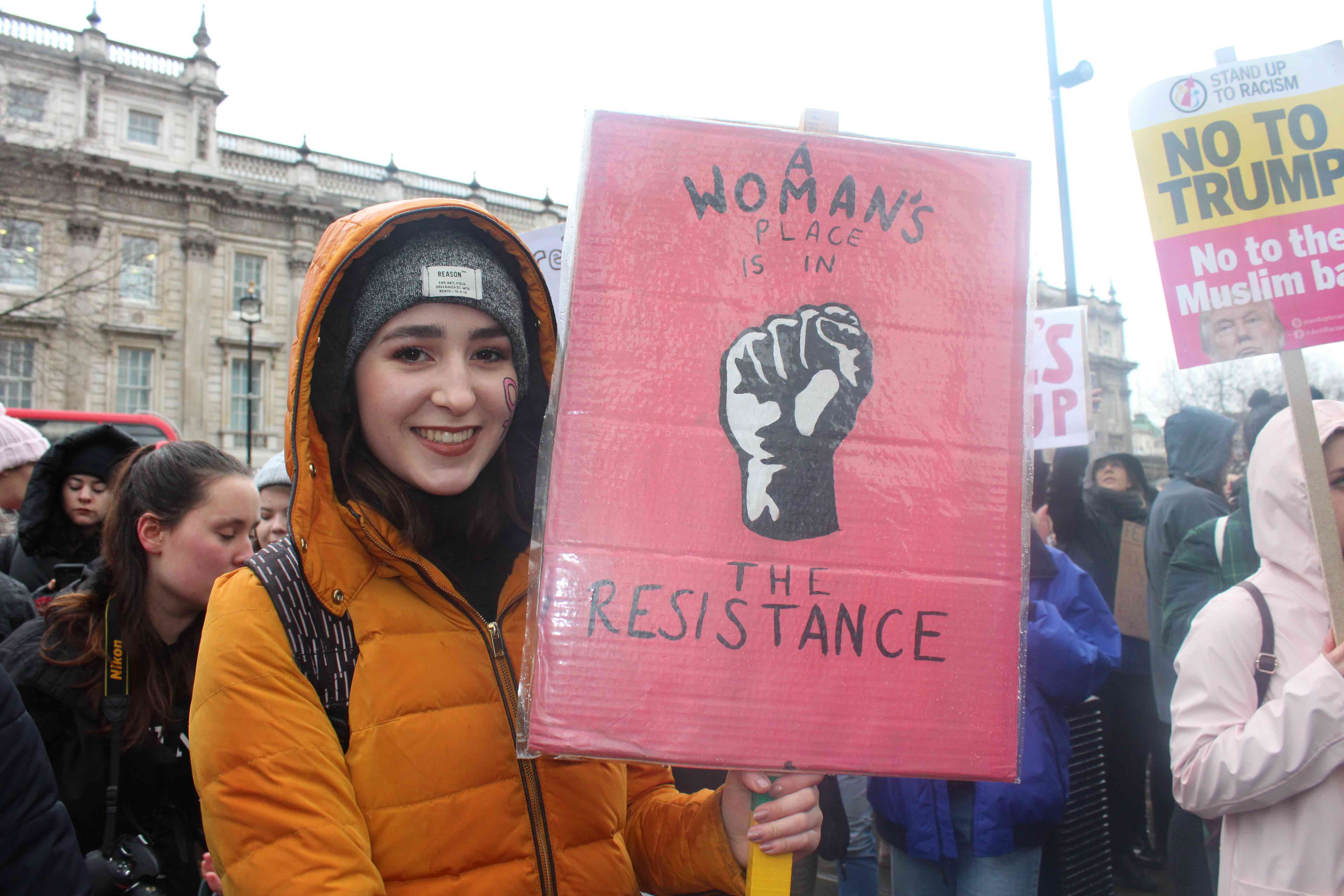Image may contain: Text, Banner, Crowd, Person, People, Human