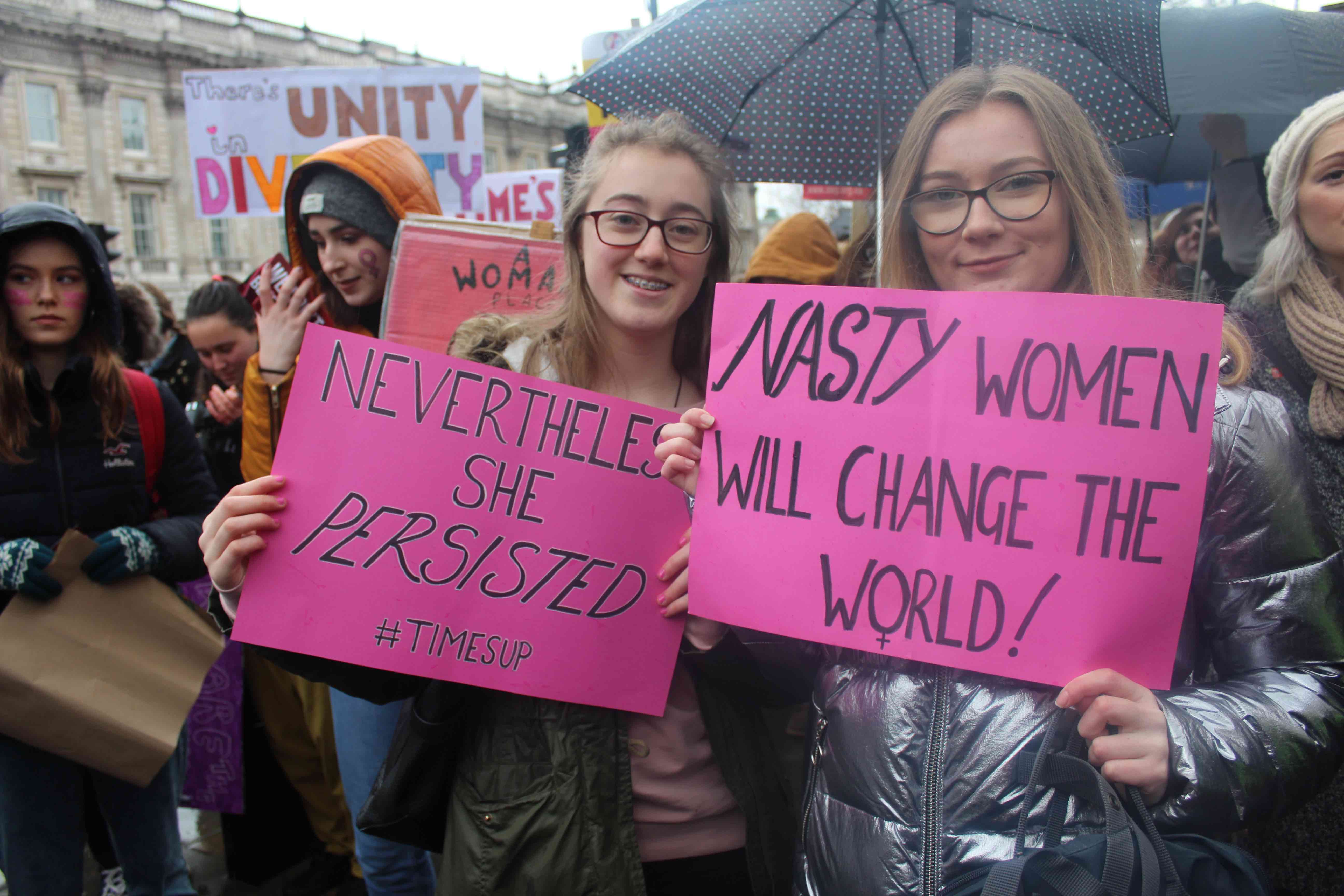 Image may contain: Text, Banner, Parade, Crowd, Person, People, Human