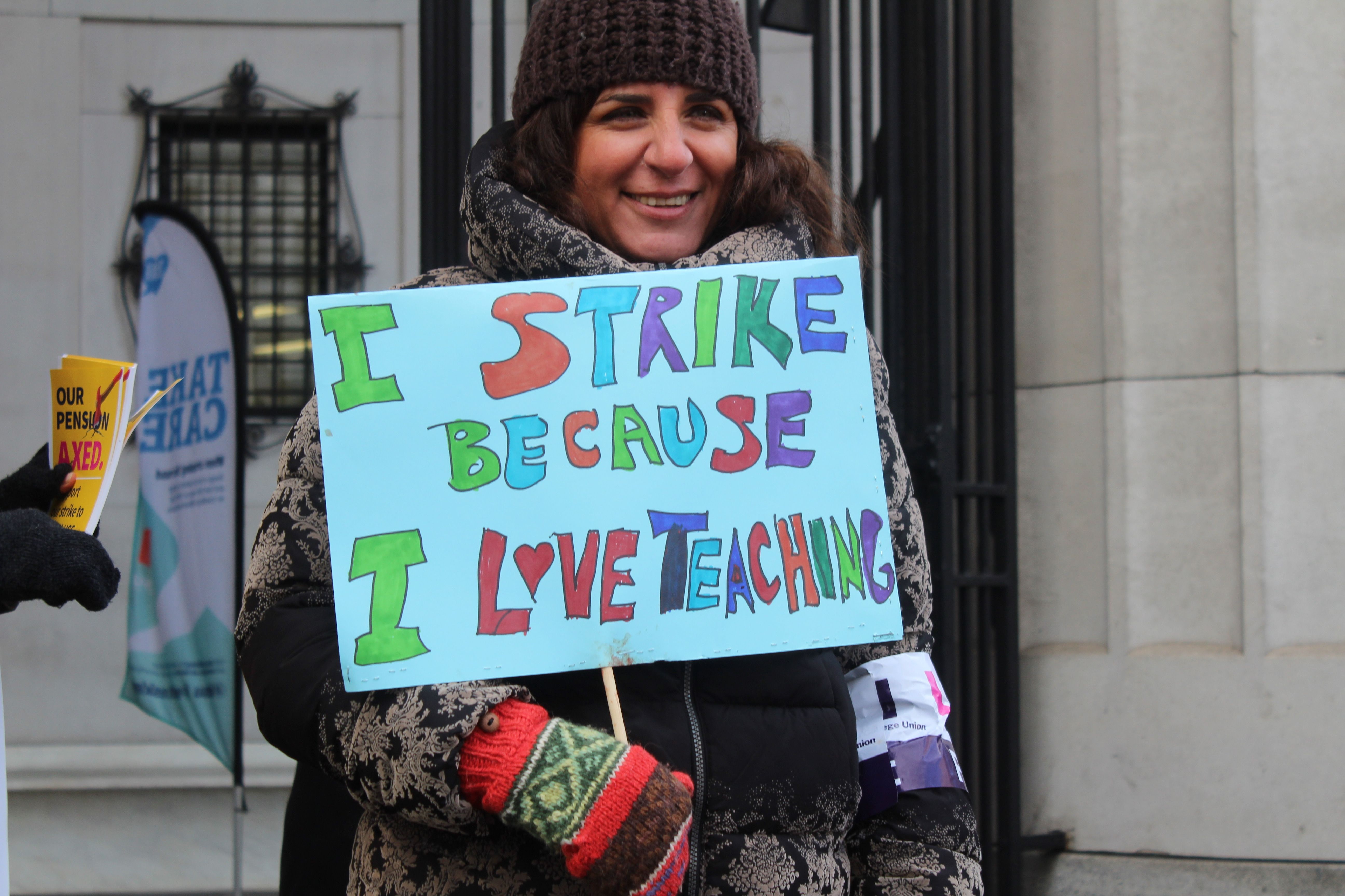 Image may contain: Crowd, Text, Banner, Person, People, Human