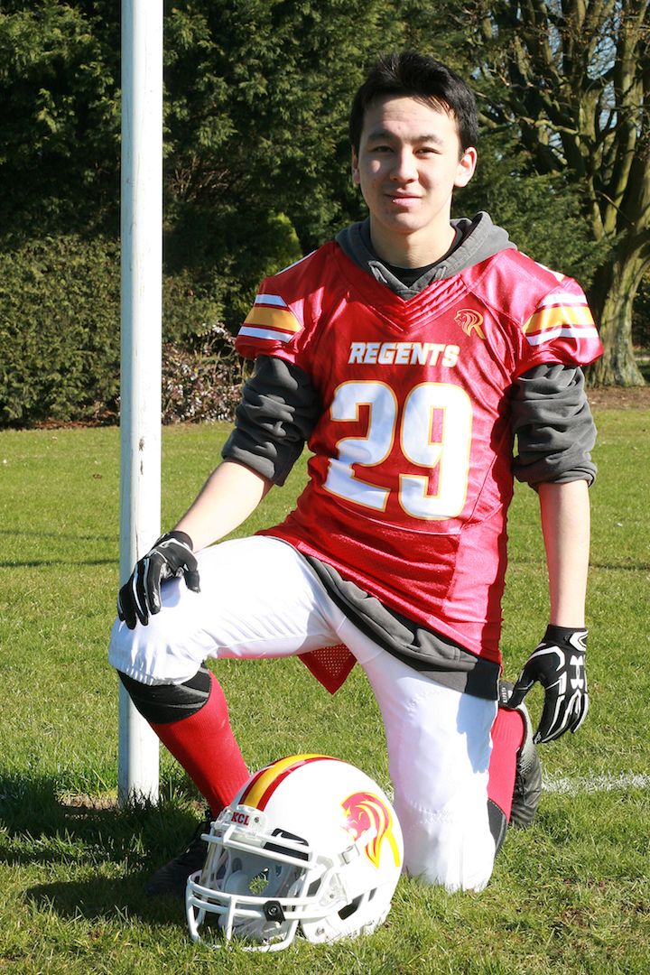 Image may contain: Helmet, Hardhat, Football Helmet, Crash Helmet, Clothing, American Football, Ankle, Team Sport, Team, Sports, Sport, Soccer, Football, Person, People, Human